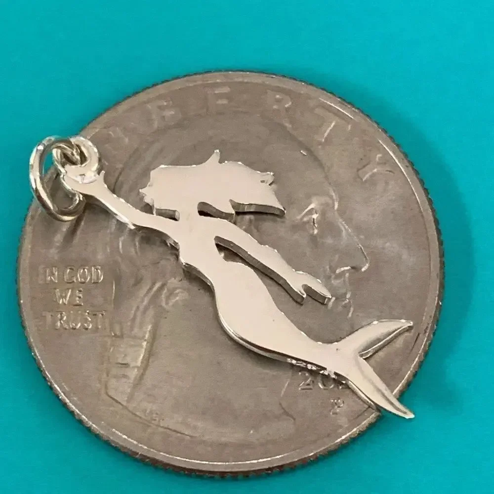 independent mermaid swimming